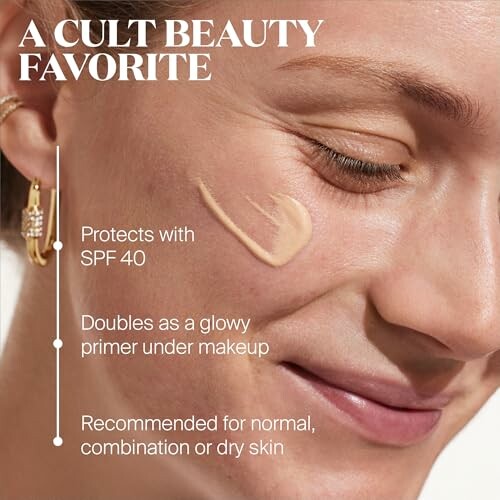 Woman applying SPF 40 primer on face, described as a beauty favorite.