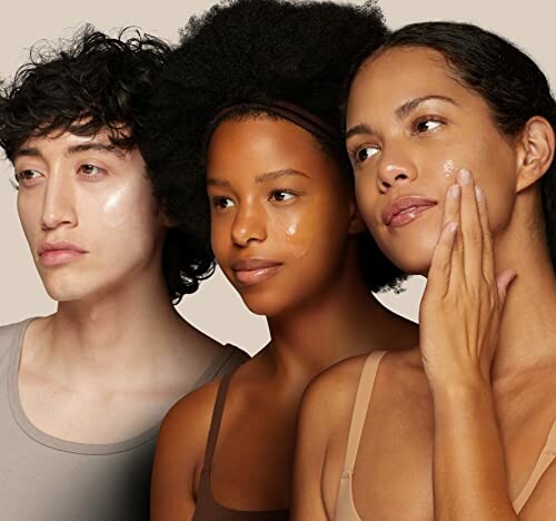 Three individuals with glowing skin demonstrating skincare routine.