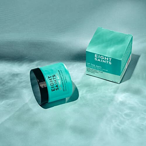 Eight Saints skincare product with box on teal background.