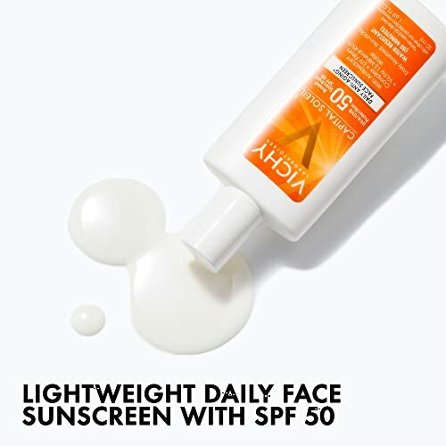 Sunscreen bottle with spilled lotion, SPF 50.