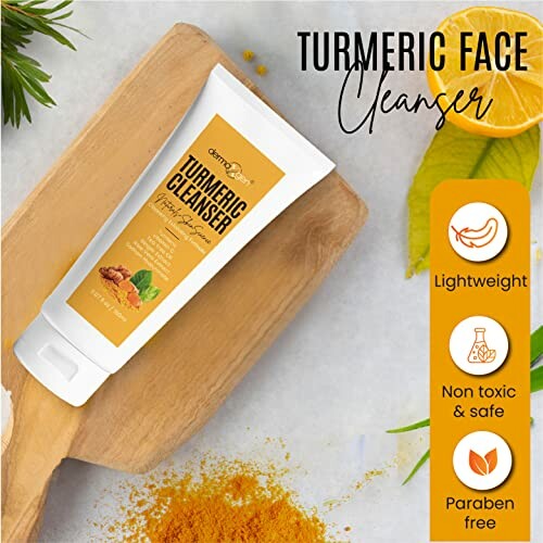 Turmeric face cleanser tube with benefits listed: lightweight, non-toxic, paraben-free.