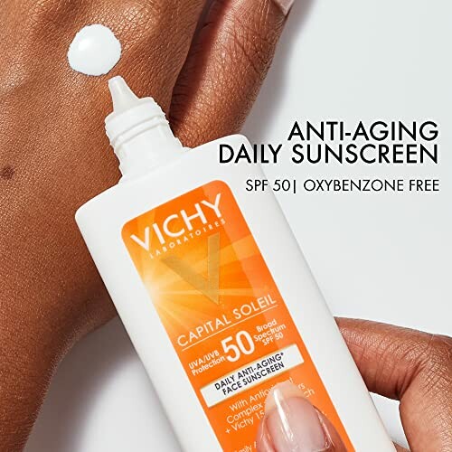 Vichy anti-aging daily sunscreen SPF 50 application on skin.